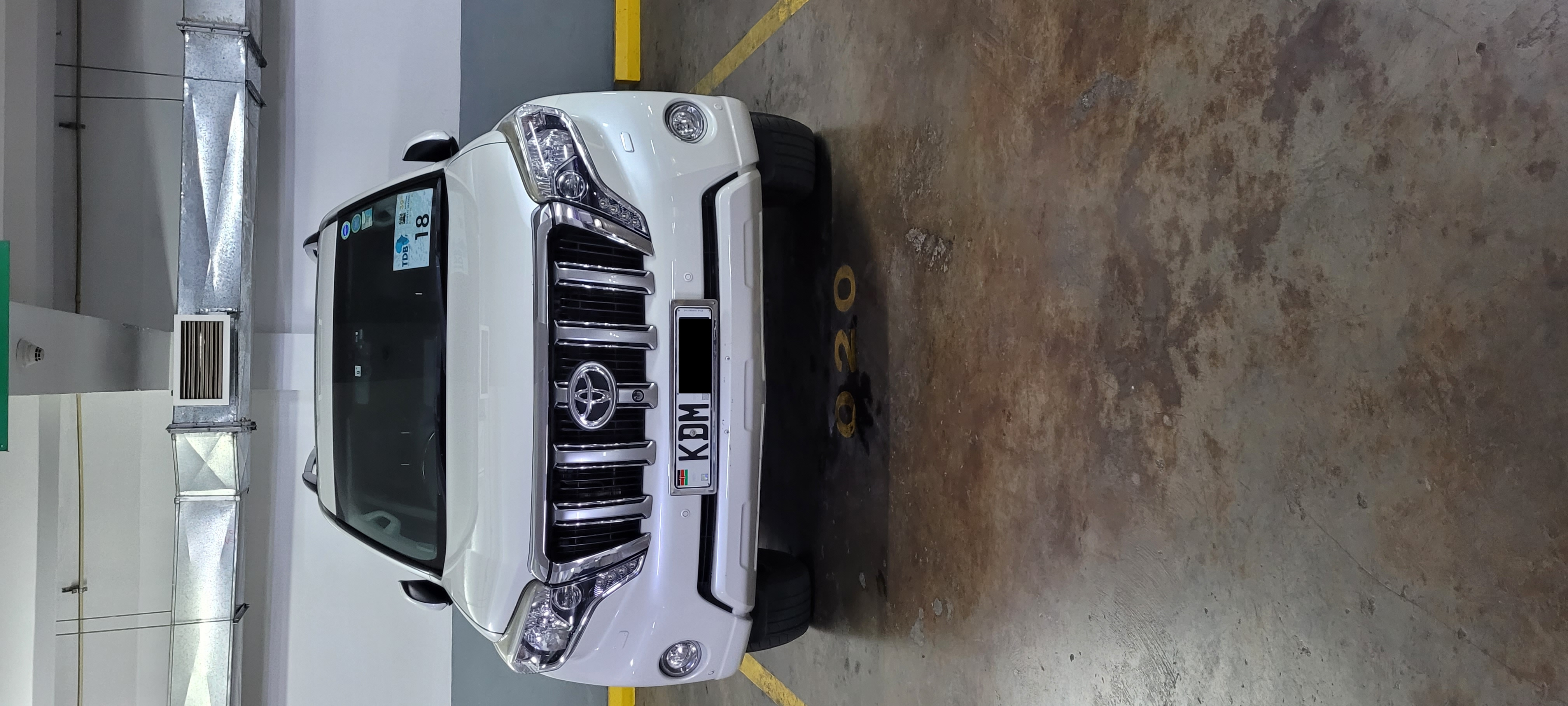 Prado parked, front view